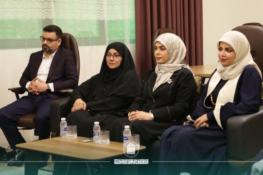 The Dean discusses cooperation with the Iraqi Programmers Syndicate during a visit to extend an invitation for the launch event.